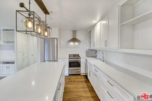 a view of a livingroom with wooden floor