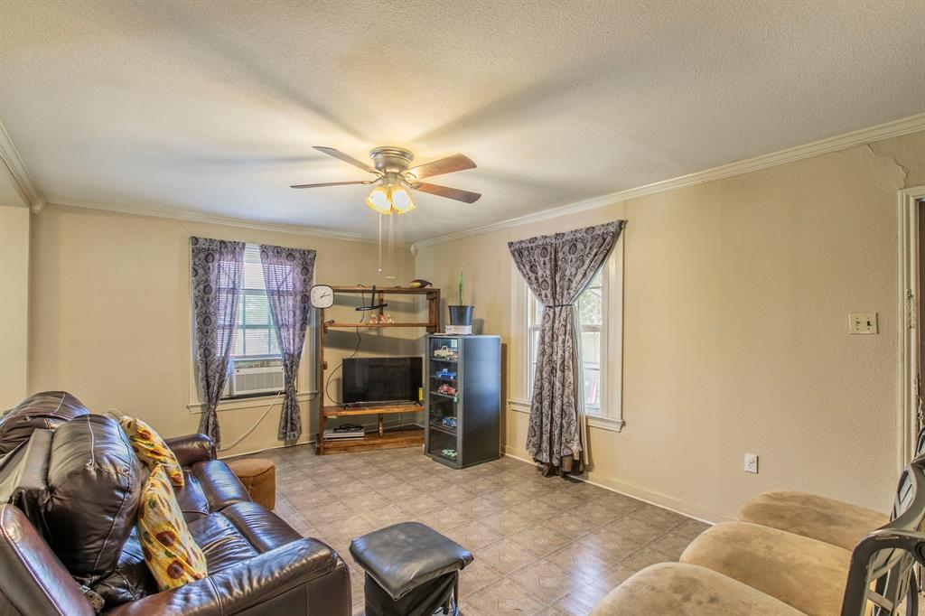 2101 Pine Avenue Waco, TX 76708 - Photo 2 of 27 a view of a livingroom with furniture and a ceiling fan
