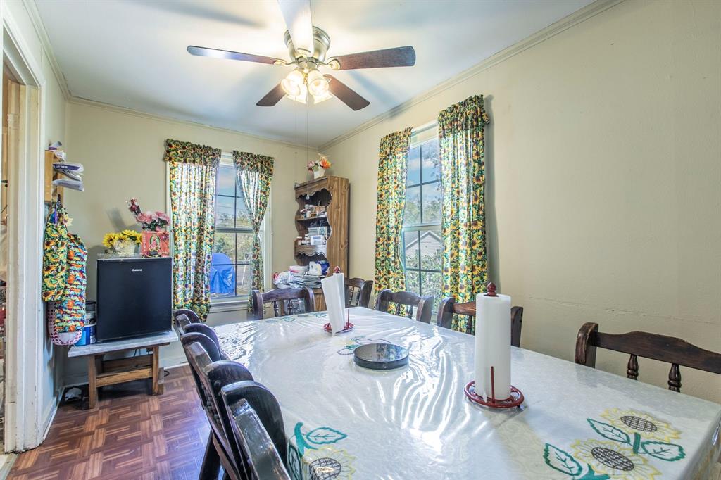 2101 Pine Avenue Waco, TX 76708 - Photo 9 of 27 a view of a dining room with furniture window and outside view
