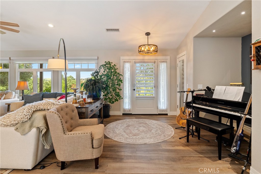 4010 Traffic Way Atascadero, CA 93422 - Photo 13 of 56 Vinyl plank flooring flows beautifully throughout
