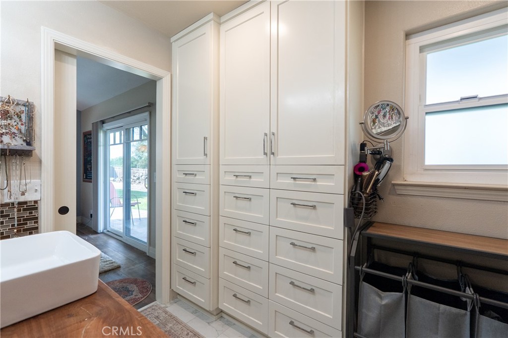 4010 Traffic Way Atascadero, CA 93422 - Photo 29 of 56 Thoughtfully designed custom cabinetry creates abundant bathroom storage