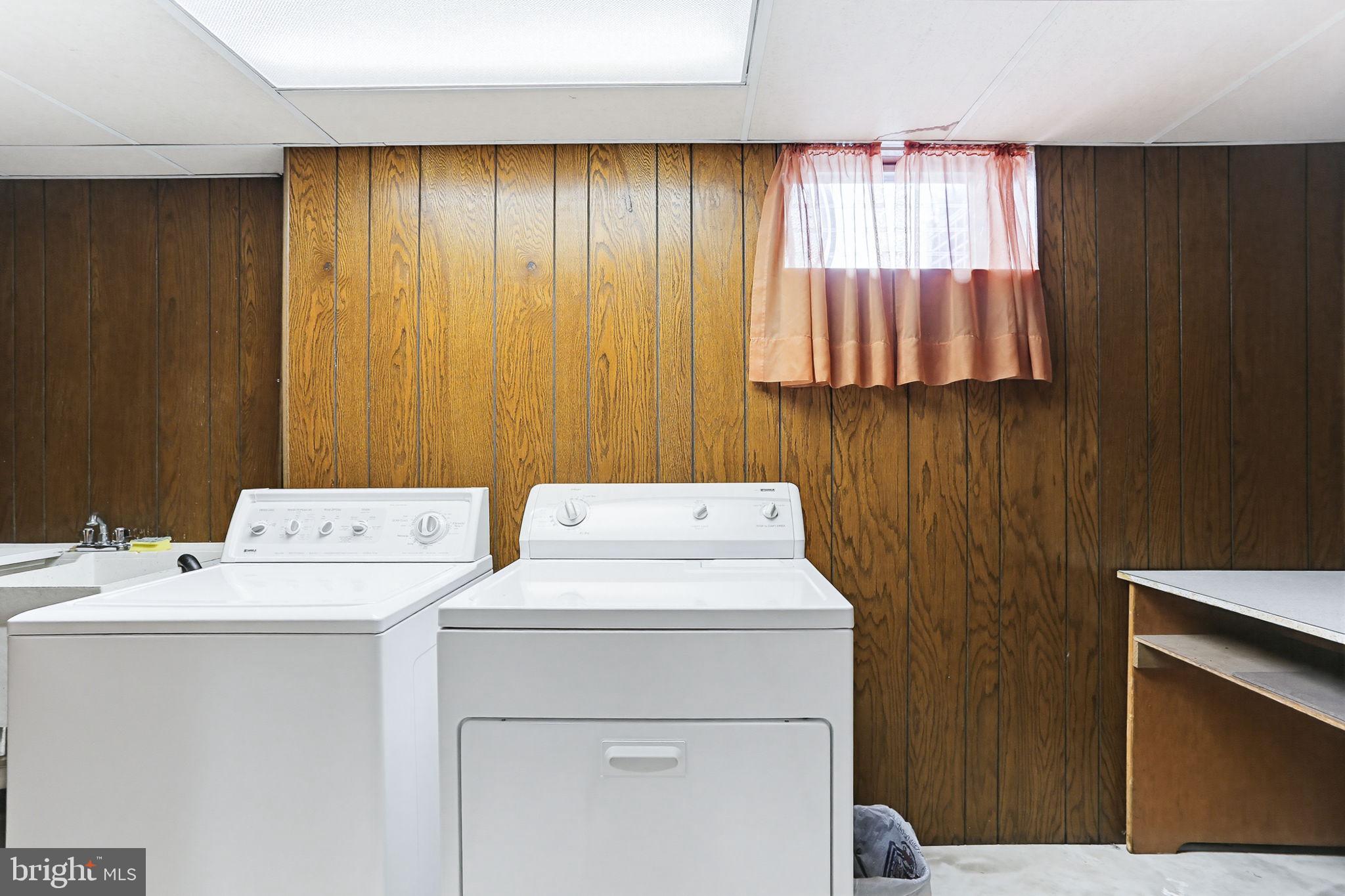 9301 Gardenia Road Baltimore, MD 21236 - Photo 35 of 37 a utility room with dryer and washer