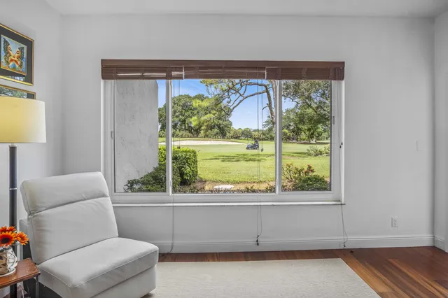 a view of a room with a large window