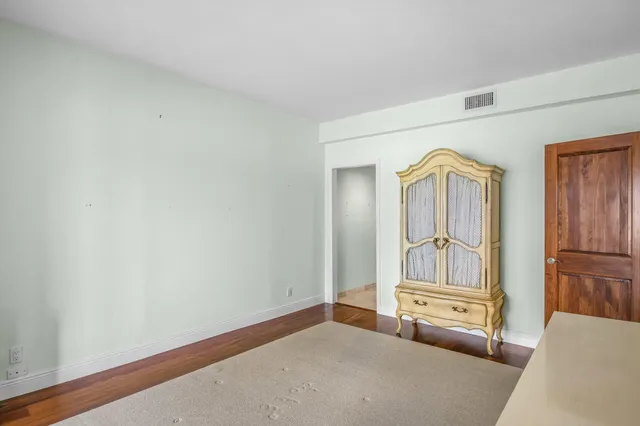 a view of empty room with front door