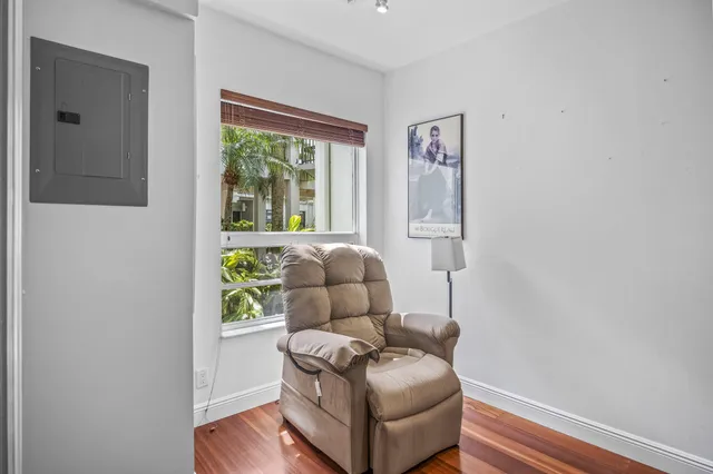 a living room with furniture and a window