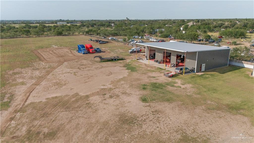 4315 West Mile 7 Road Mission, TX 78574 - Photo 2 of 4 an aerial view of a house with a yard