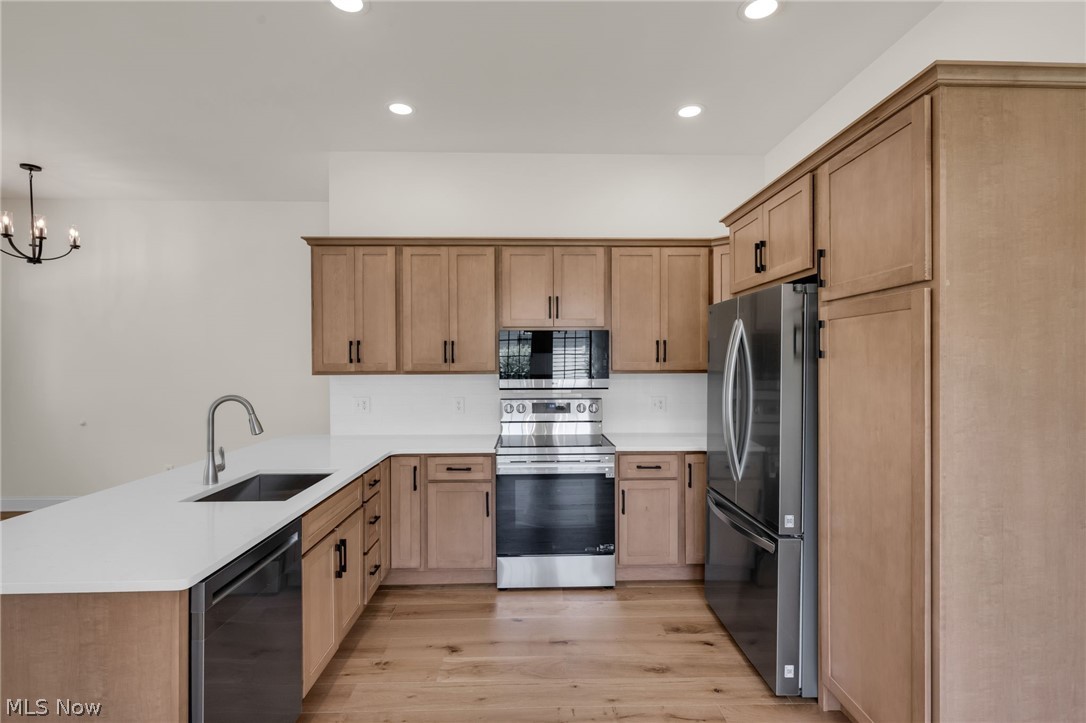 623 Bridgeview Avenue Chester, WV 26034 - Photo 8 of 47 Eat-in kitchen featuring stainless steel appliances and hardwood floors