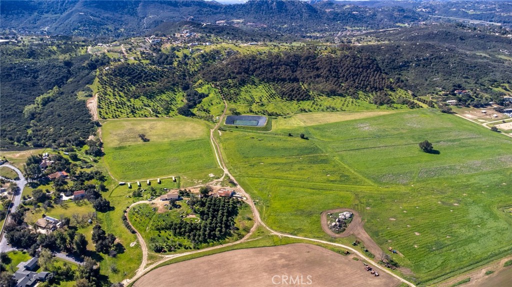 15300 Round Tree Road Valley Center, CA 92082 - Photo 11 of 12 a view of a back yard of a house