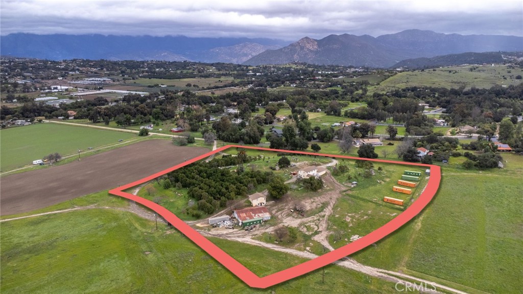15300 Round Tree Road Valley Center, CA 92082 - Photo 4 of 12 a view of a tennis court