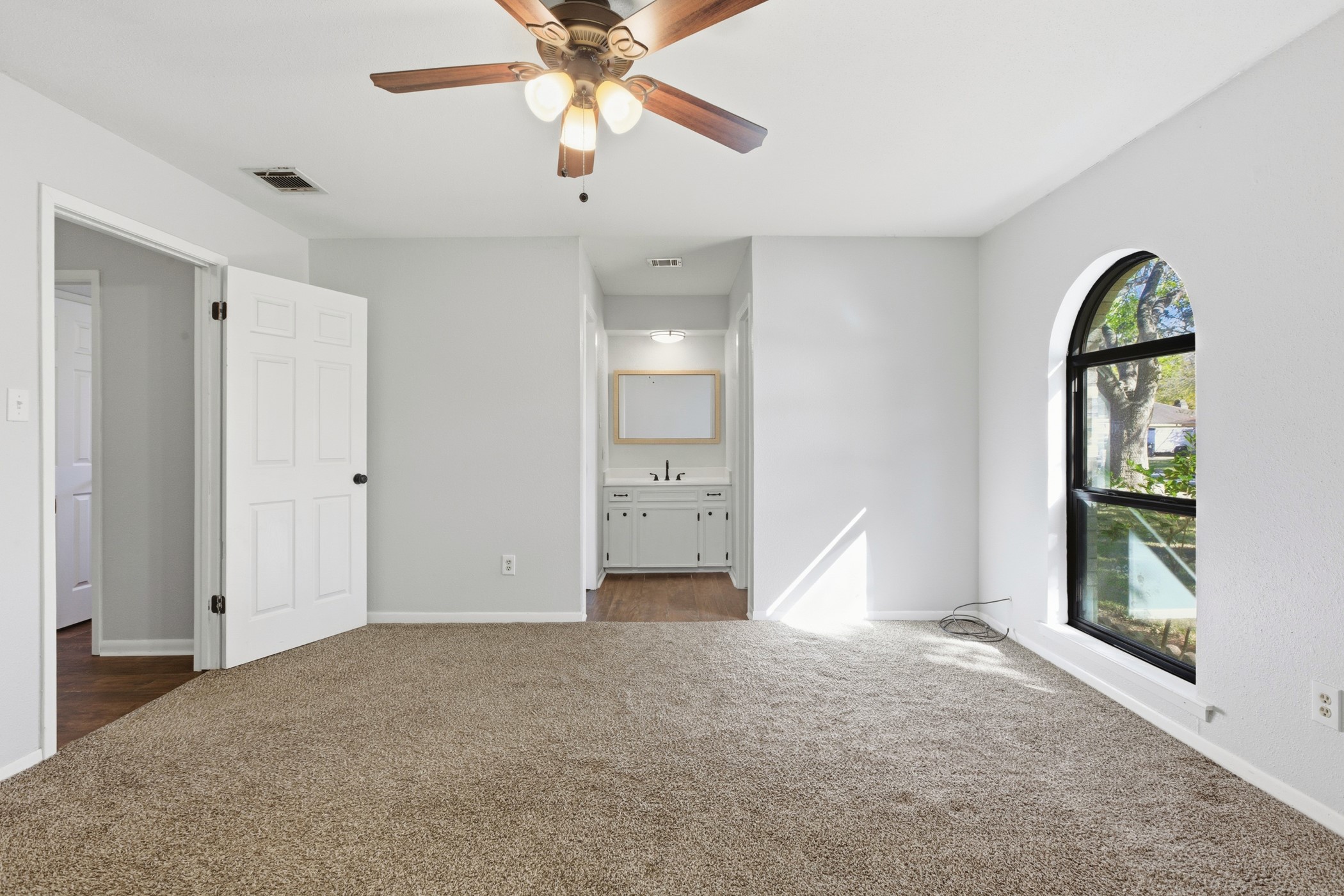 3721 Avenue R Rosenberg, TX 77471 - Photo 27 of 43 Primary suite layout shown with direct access to vanity area and ensuite bath.