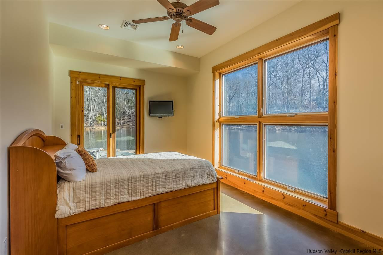 11 Sparkling Ridge Road New Paltz, NY 12561 - Photo 14 of 34 a bedroom with a bed and window