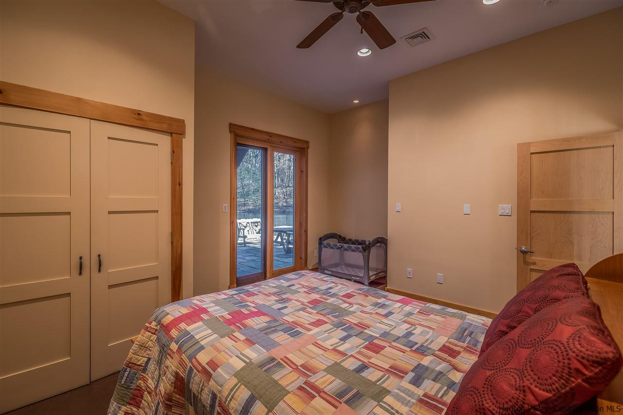 11 Sparkling Ridge Road New Paltz, NY 12561 - Photo 16 of 34 a bedroom with a bed and a closet