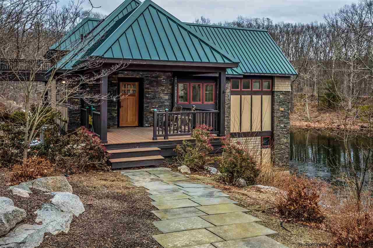 11 Sparkling Ridge Road New Paltz, NY 12561 - Photo 24 of 34 a front view of a house with garden