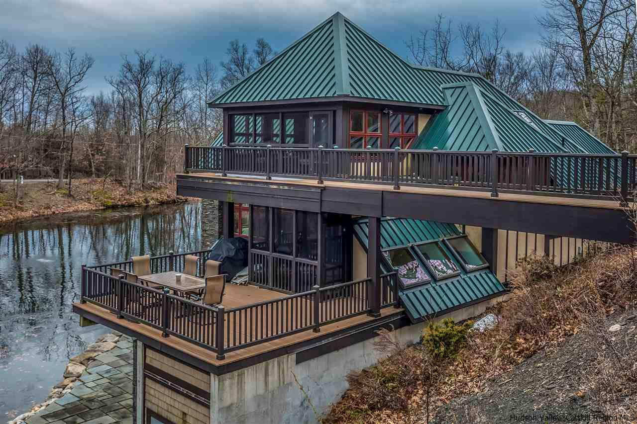 11 Sparkling Ridge Road New Paltz, NY 12561 - Photo 26 of 34 a view of a roof deck with wooden fence and floor