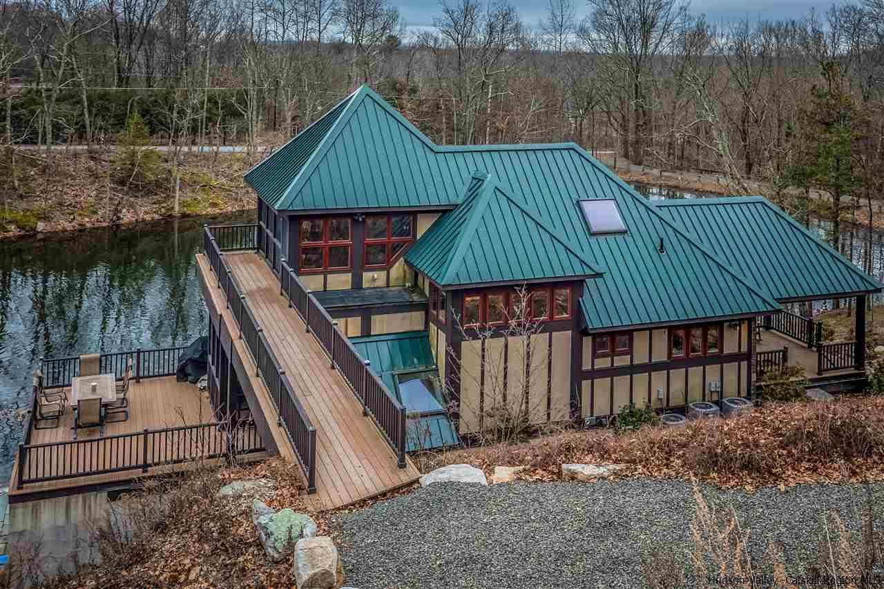 11 Sparkling Ridge Road New Paltz, NY 12561 - Photo 27 of 34 a backyard of a house with seating space