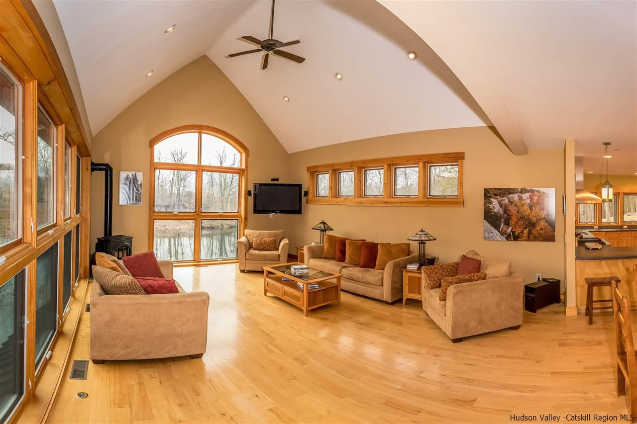 11 Sparkling Ridge Road New Paltz, NY 12561 - Photo 4 of 34 a living room with furniture and a large window