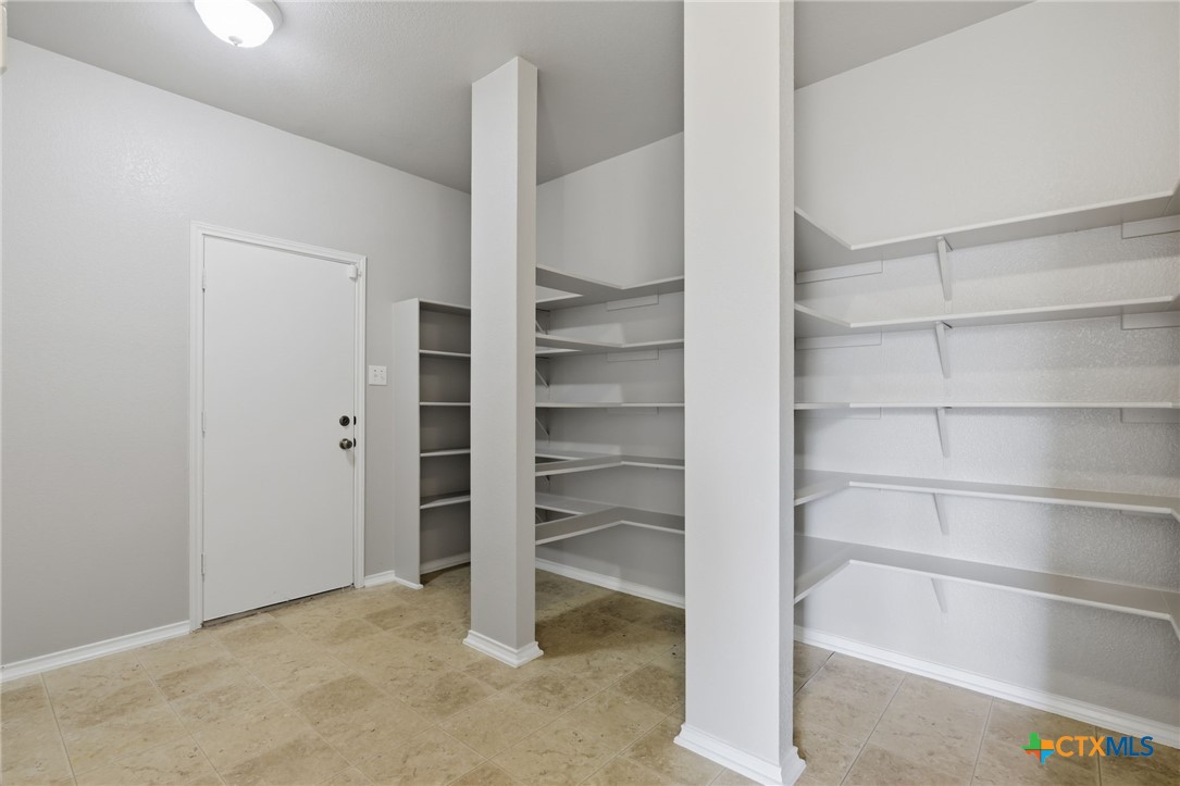 8716 Starview Street Temple, TX 76502 - Photo 26 of 36 Reach-in closet featuring built-in wire shelving for easy organization.