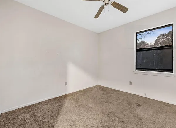 a view of a room with rack on the wall