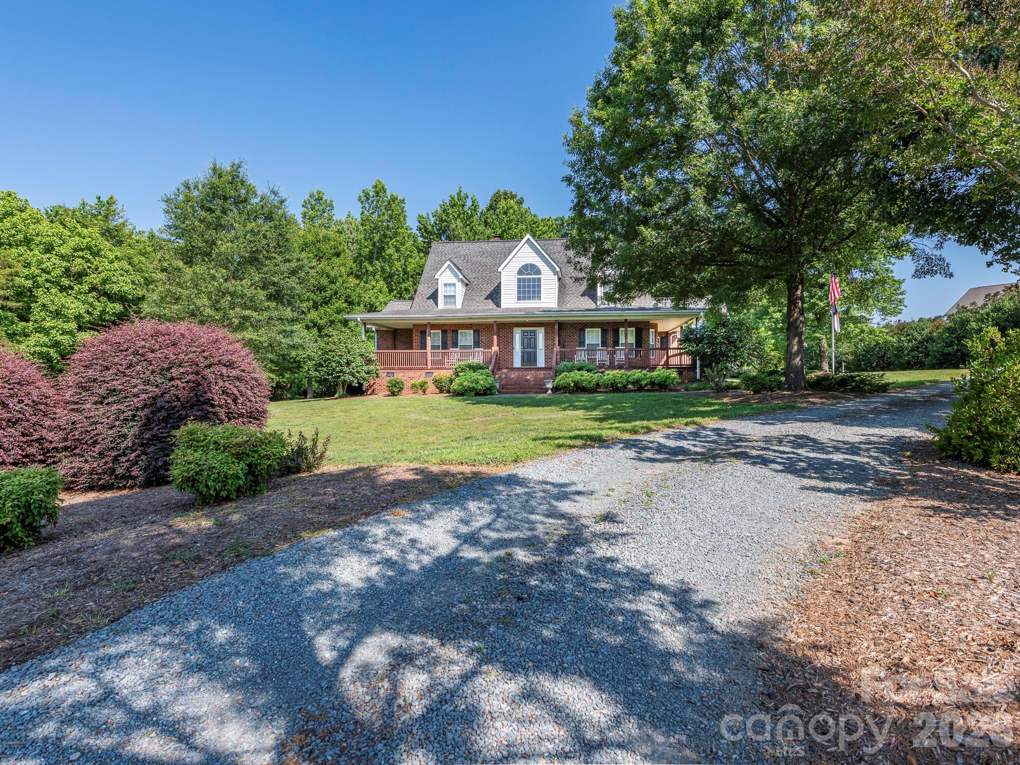4440 Hucks Road Charlotte, NC 28269 - Photo 43 of 45 a view of a house with a yard
