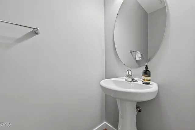 a kitchen with stainless steel appliances a stove a sink and a refrigerator