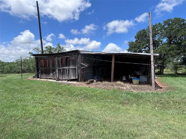 a balcony with trees in the background