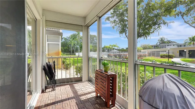 a view of balcony with a potted plant