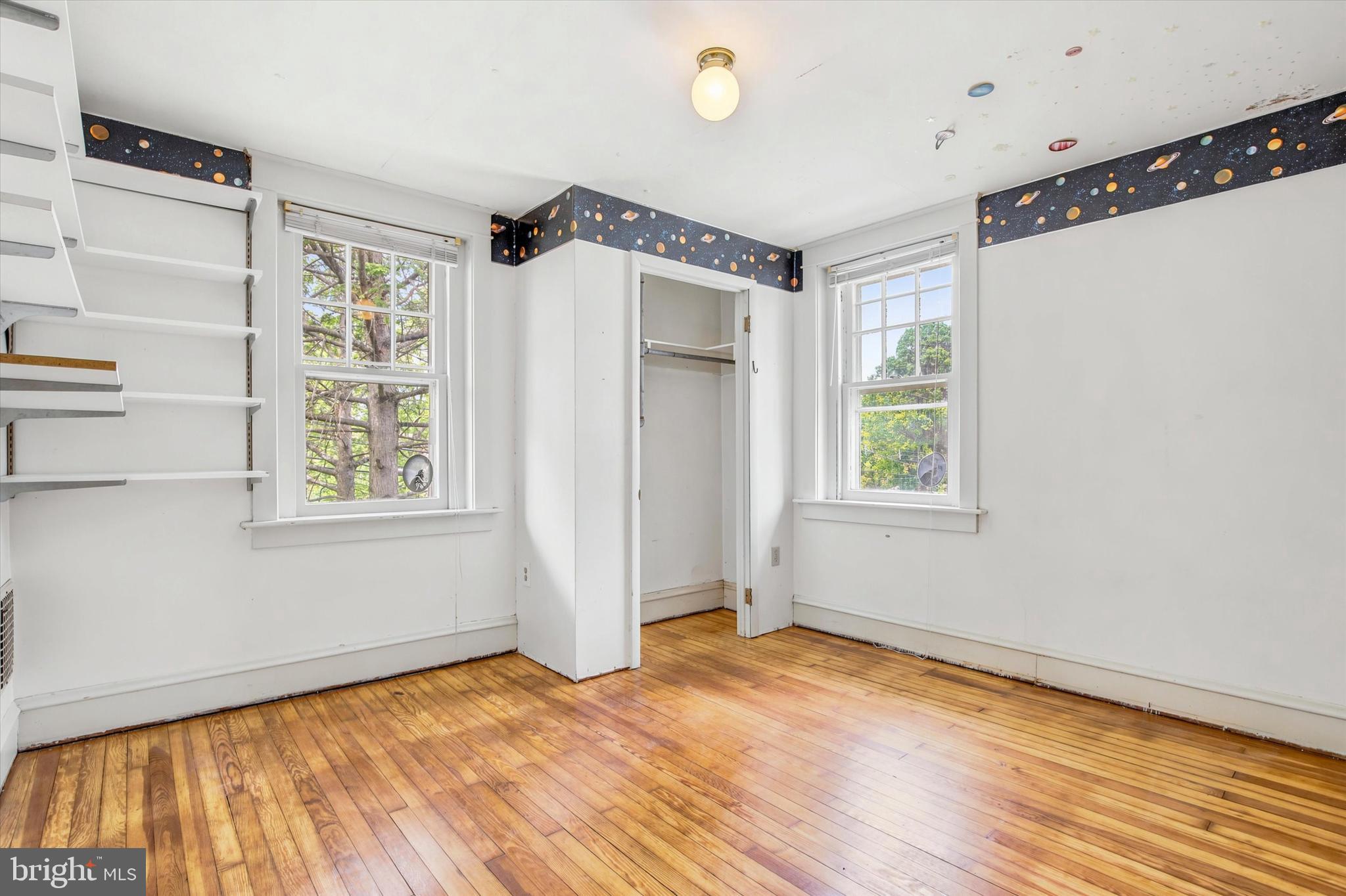 3131 Bedminster Road Ottsville, PA 18942 - Photo 17 of 23 a view of an empty room with wooden floor and a window