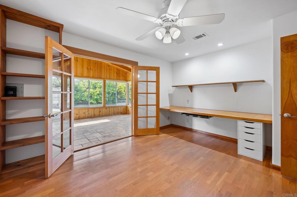 1054 Hermes Avenue Encinitas, CA 92024 - Photo 14 of 37 wooden floor in an empty room with a window