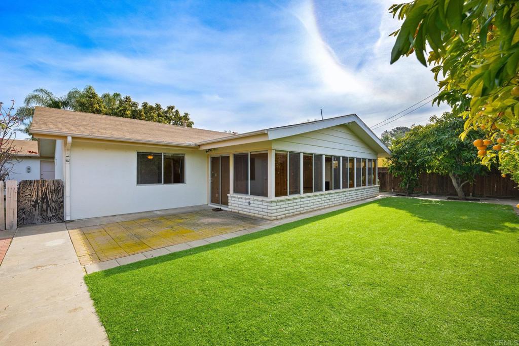 1054 Hermes Avenue Encinitas, CA 92024 - Photo 23 of 37 a view of a house with a yard and a patio