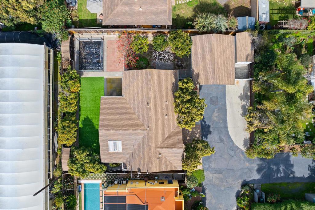 1054 Hermes Avenue Encinitas, CA 92024 - Photo 28 of 37 an aerial view of house with yard and swimming pool