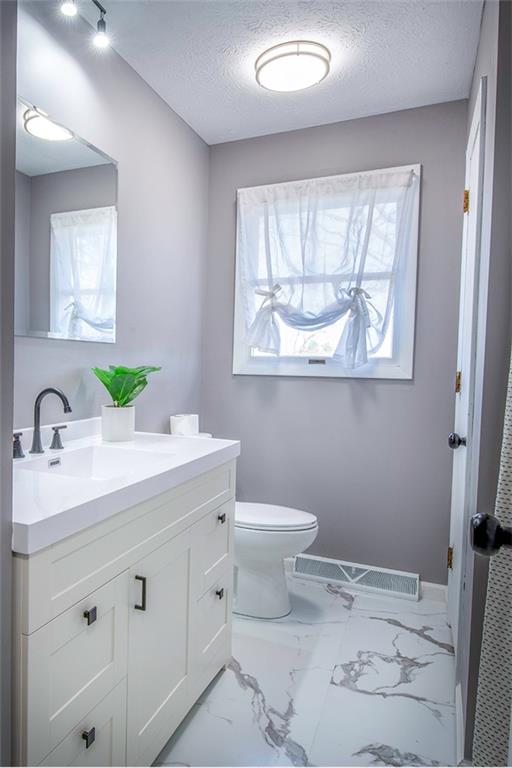 25 Maple Road Greenville, PA 16125 - Photo 12 of 14 a bathroom with a sink and a mirror