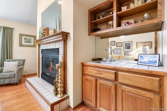 a view of living room filled with furniture and baby furniture