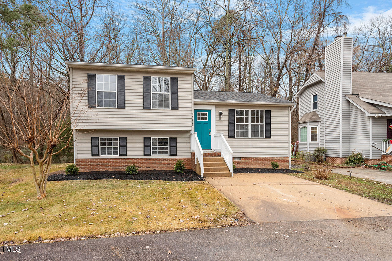 8341 Wynewood Court Raleigh, NC 27616 - Photo 27 of 35 a front view of a house with a yard