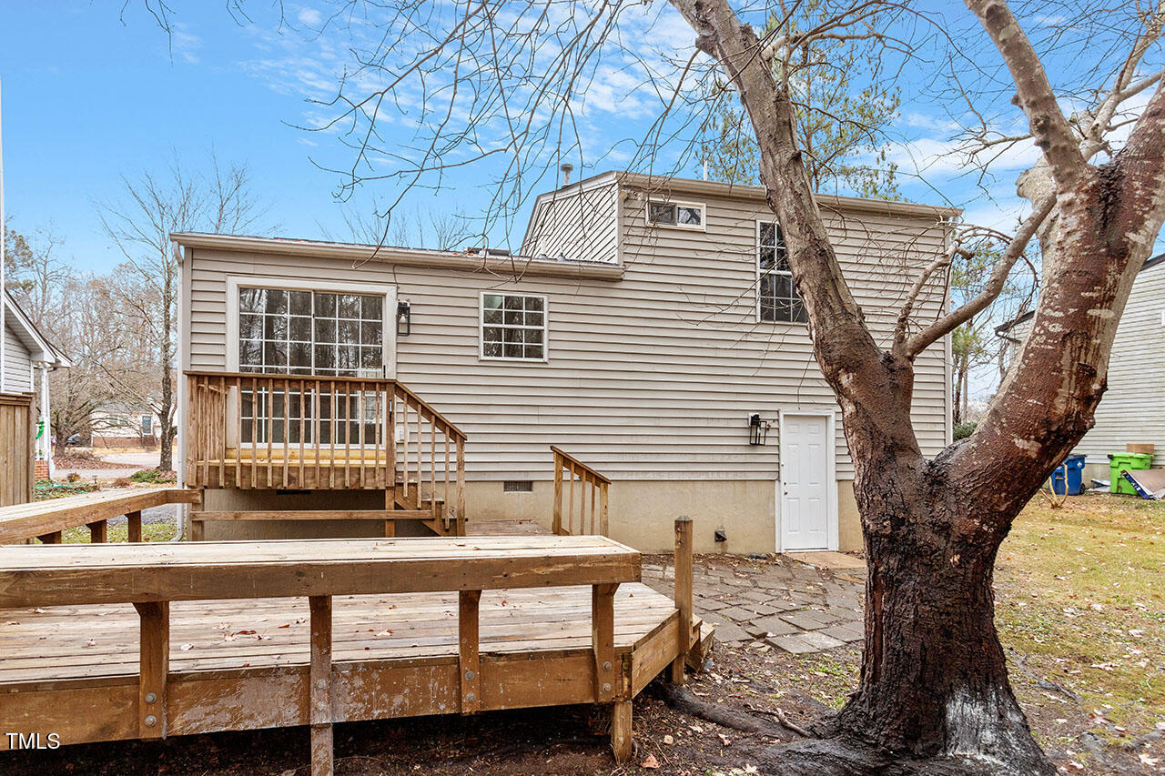 8341 Wynewood Court Raleigh, NC 27616 - Photo 31 of 35 a front view of a house with a tree