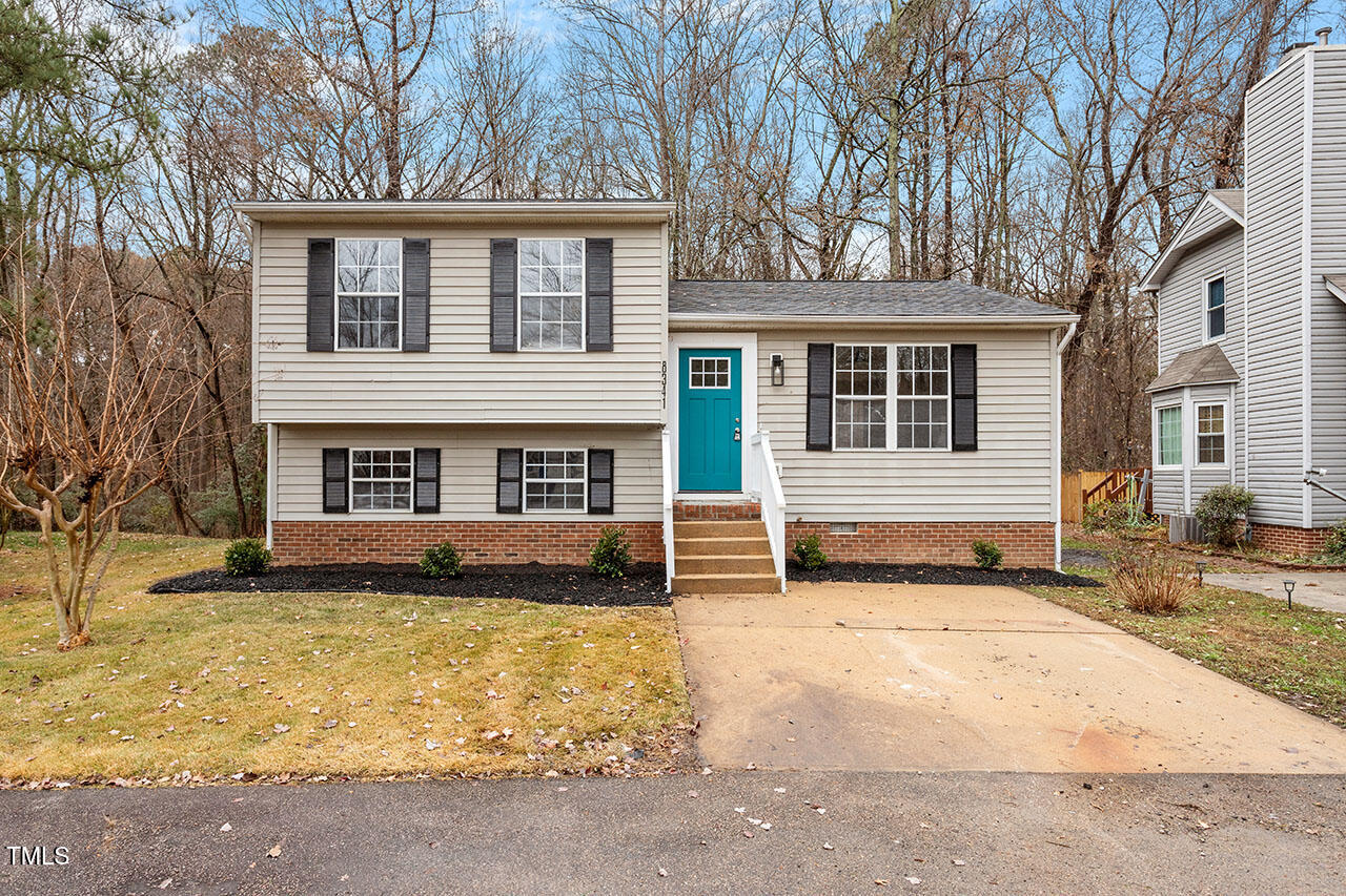 8341 Wynewood Court Raleigh, NC 27616 - Photo 33 of 35 a view of a house with a yard