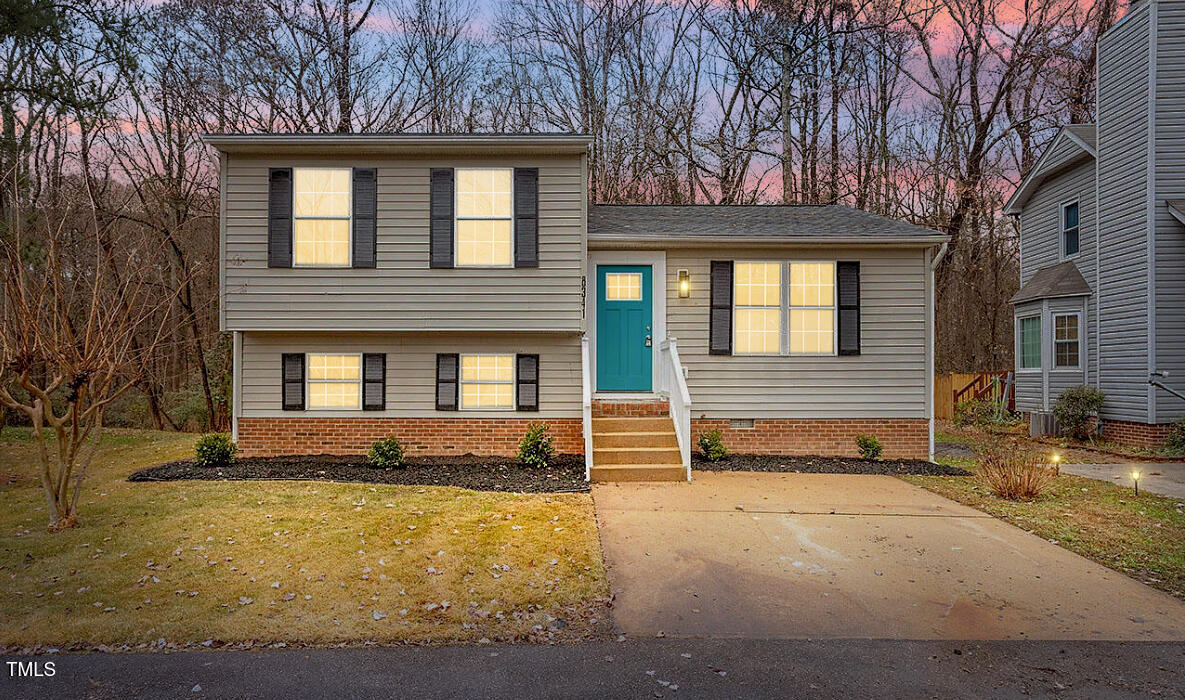 8341 Wynewood Court Raleigh, NC 27616 - Photo 35 of 35 a front view of a house with a yard