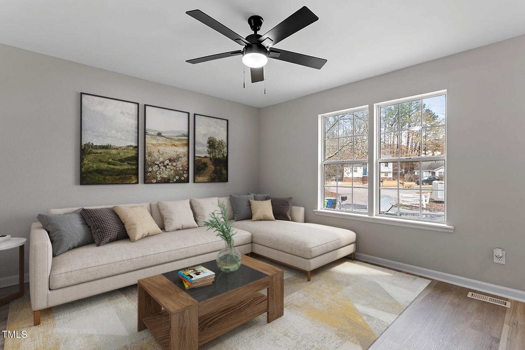 8341 Wynewood Court Raleigh, NC 27616 - Photo 8 of 35 a living room with furniture and a large window