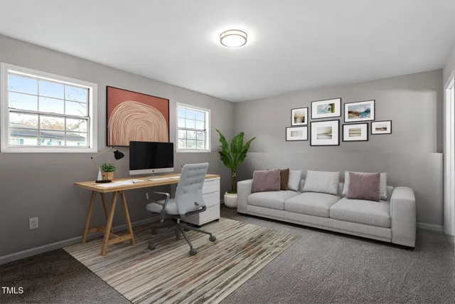 a living room with furniture a table and a window