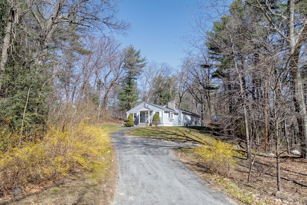 21 Spaulding Road Chelmsford, MA 01824 - Photo 3 of 40 a view of swimming pool with a yard