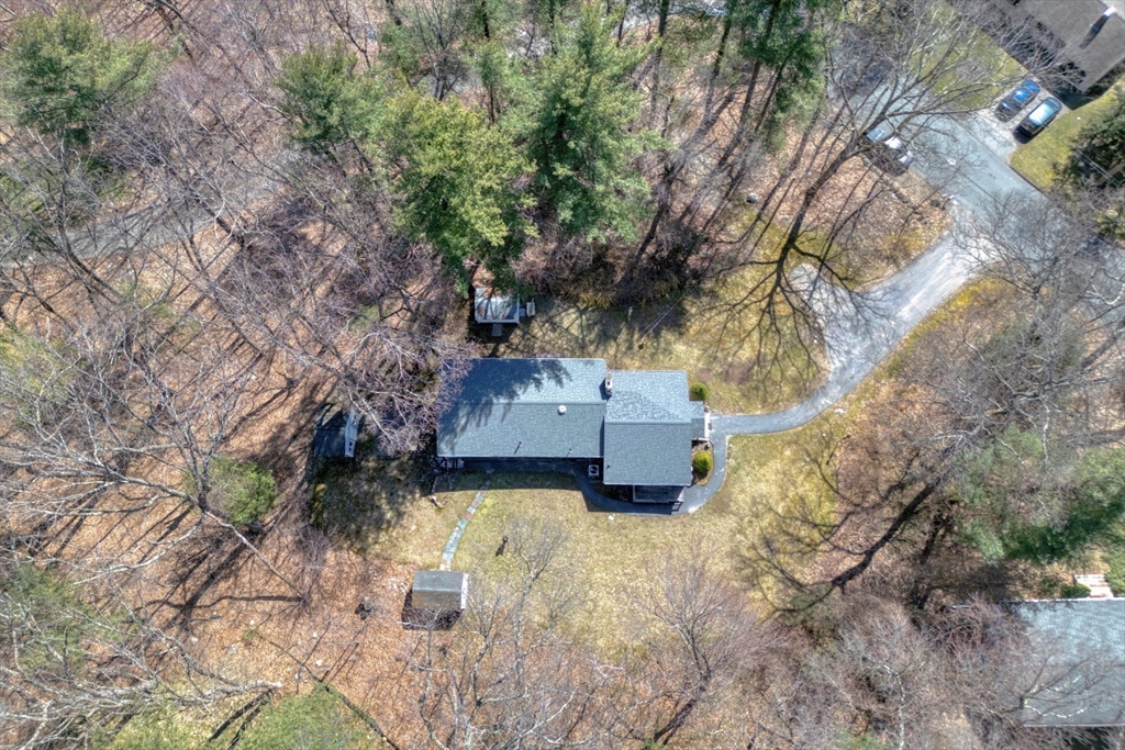 21 Spaulding Road Chelmsford, MA 01824 - Photo 5 of 40 a view of a houses with a yard