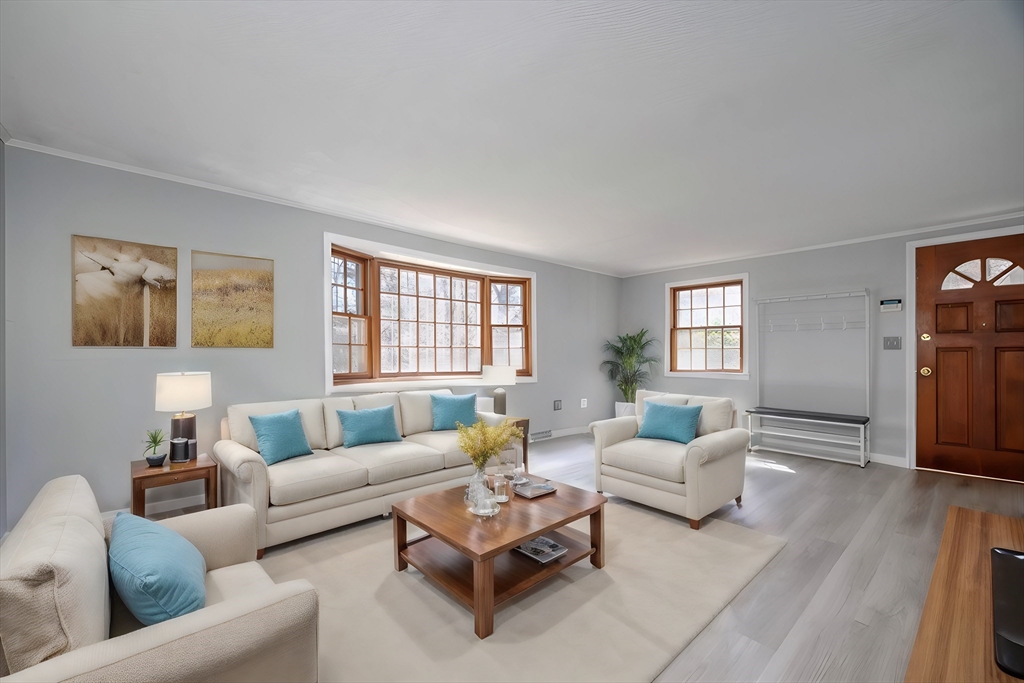 21 Spaulding Road Chelmsford, MA 01824 - Photo 9 of 40 a living room with furniture and a window