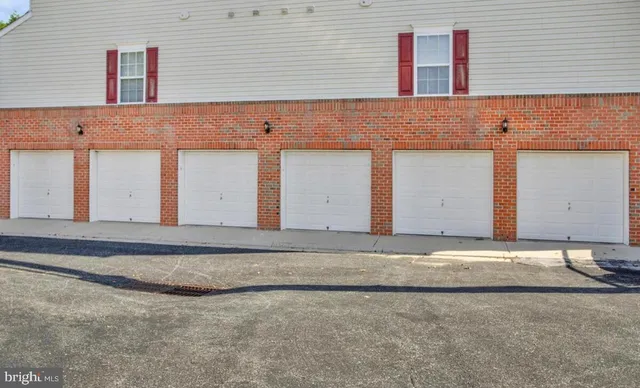front view of a house with a street