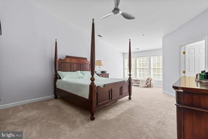1556 Penzance Way Hanover, MD 21076 - Photo 20 of 40 a bed room with a bed and a night stand
