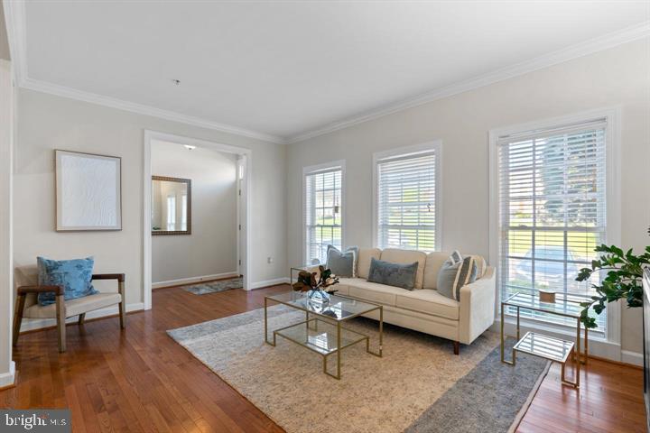 1556 Penzance Way Hanover, MD 21076 - Photo 2 of 40 a living room with furniture and a large window