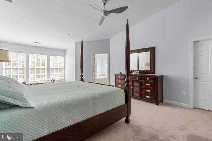 1556 Penzance Way Hanover, MD 21076 - Photo 21 of 40 a bedroom with a bed dresser and a window