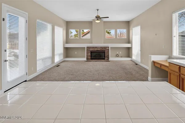 a kitchen with a stove a sink and a microwave