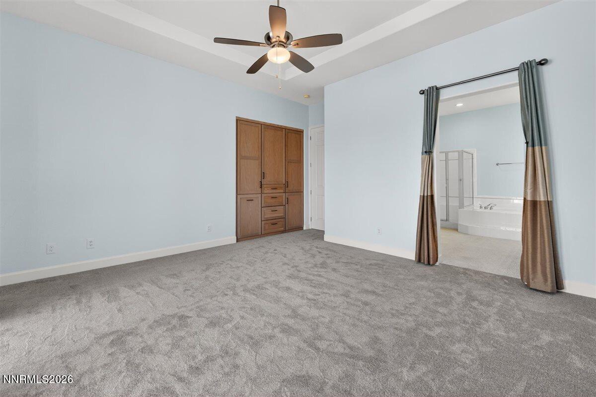2214 St George Way Carson City, NV 89703 - Photo 27 of 57 an empty room with fan and entryway