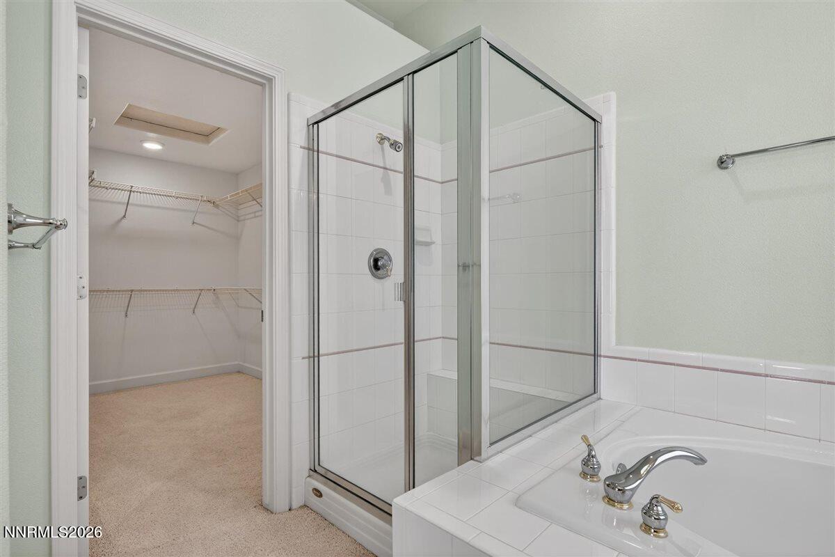 2214 St George Way Carson City, NV 89703 - Photo 31 of 57 a bathroom with a shower and a sink