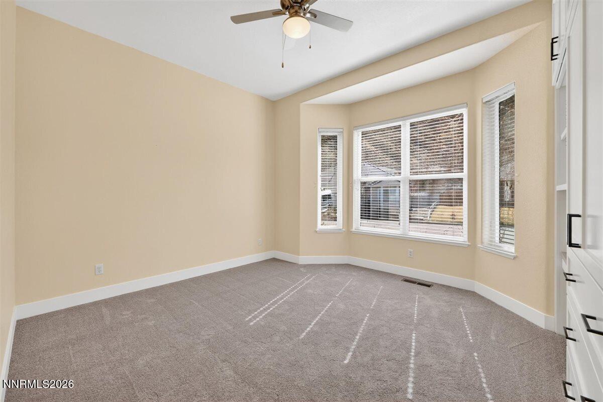 2214 St George Way Carson City, NV 89703 - Photo 37 of 57 a view of an empty room with a window
