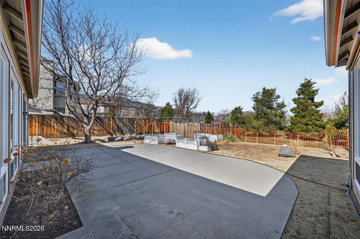 2214 St George Way Carson City, NV 89703 - Photo 44 of 57 a view of a backyard of the house